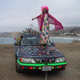 Illustration for article titled Groovalicious Purple Princess Of Peace Art Car Falls On Hard Times, Faces Crusher